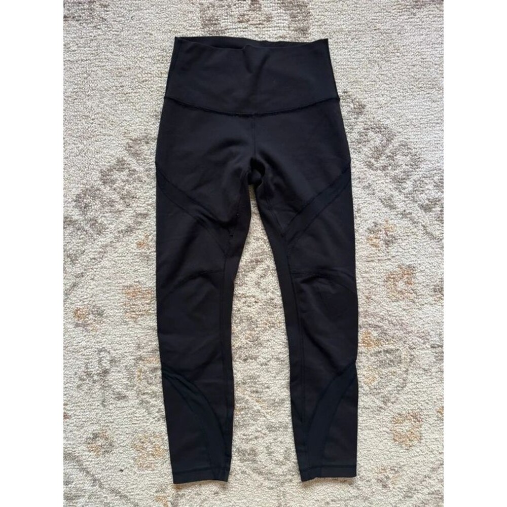 Lululemon solid black 25” leggings w/ mesh size 4 - EUC!!